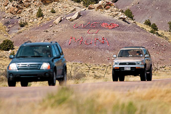 A sign dedicated to Ramona Ellsworth is on a hillside at Fort Wingate. Ellsworth committed suicide three weeks ago, leaving six children behind. &copy; 2011 Gallup Independent / Brian Leddy